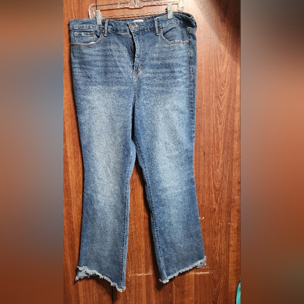 High-rise, bootleg, raw hem jeans